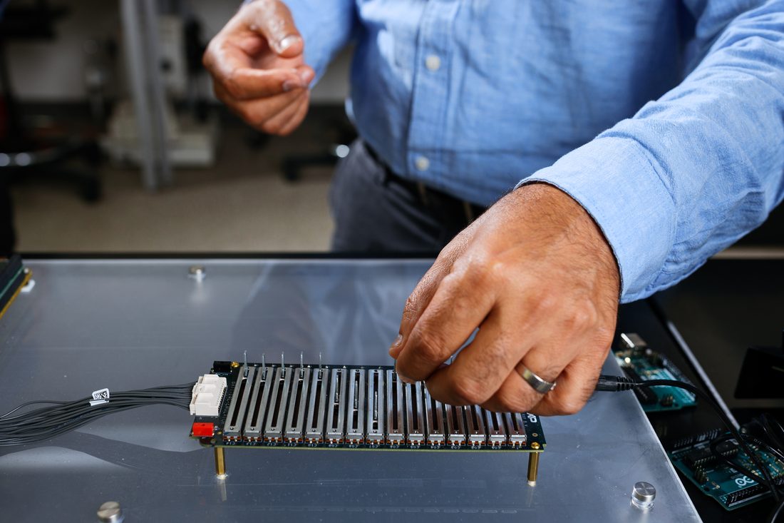 Array of test boards instrumented for measurement
